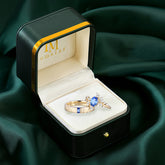 Nature-Inspired 6-Prong Oval Cut Sapphire Engagement Ring Set